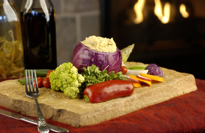 Chicken Hummus in purple cabbage with vegetables