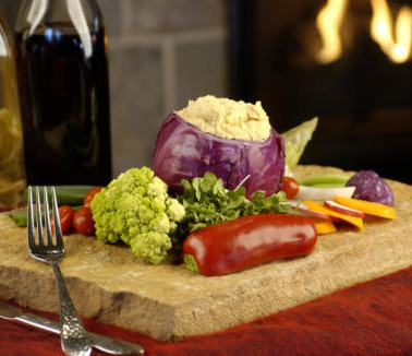 Chicken Hummus in purple cabbage with vegetables